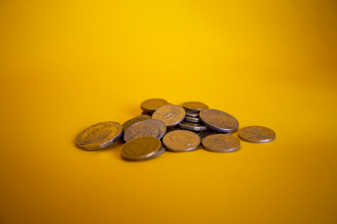 Close-up of gold and silver coins, a reminder of the bags of gold in the parable of the talents