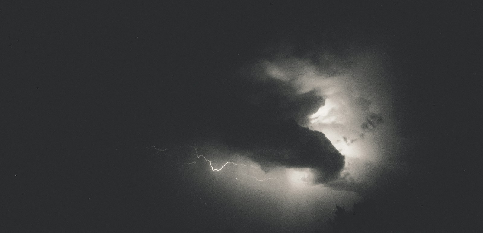 Lightning across a black sky, like the thunder and lightning before the seven trumpets of Revelation